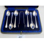 A set of six silver teaspoons and matchi