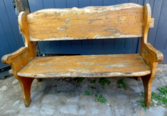 A rustic weathered pine garden bench, 53