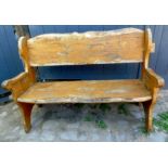 A rustic weathered pine garden bench, 53