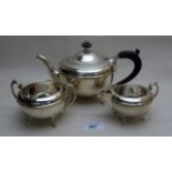 A silver three piece tea service, compri