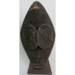 An African tribal carved wooden mask, so