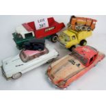 Six vintage toy vehicles, including a Tr