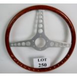 Automobilia: A vintage steering wheel, w