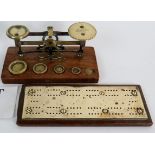 A set of small postal scales with weight