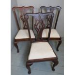 Three Chippendale design dining chairs,