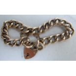 A 9ct gold curb link bracelet with 9ct g