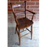 A Victorian child's high chair with an e