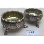 A pair of Georgian circular silver salts