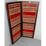 A two fold mahogany framed fire screen w