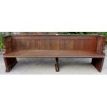 A 19th century pitch pine church pew, 76