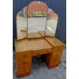 A 20th century walnut dressing table wit