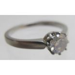 A white metal diamond solitaire ring, ap