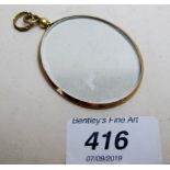 A 9ct gold framed locket est: £40-£60