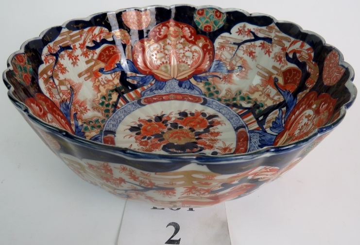 A large Japanese Imari bowl of fluted steep sided circular form, late 19th/early 20th century,