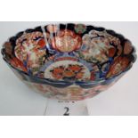 A large Japanese Imari bowl of fluted steep sided circular form, late 19th/early 20th century,