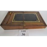 A 19th century brass bound mahogany writing slope, (slightly a/f), glass ink jar, pen tray, etc,