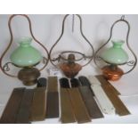 Three brass hanging lamps, two with shades, (one a/f),