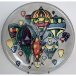 A Moorcroft decorative plate with the 'Balloons' pattern in polychrome enamels and grey ground est:
