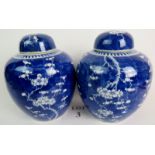 A pair of Chinese blue and white porcelain jars and covers in the Kangxi taste,