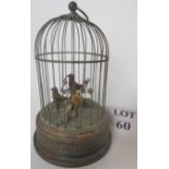 A bird cage clockwork automaton, birds sing and move, good clear sound,