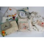 A collection of vintage table linen, including crochet, embroidered, etc,