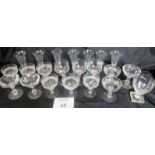 A collection of antique glassware to include champagne flutes, wine glasses, etc,