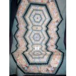 A vintage patch work quilt, quilted area approx 50" x 72",