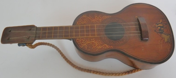 A Spanish guitar with inlaid decoration, early 20th century, fitted with a musical box, hinged lid, - Image 2 of 2