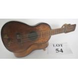 A Spanish guitar with inlaid decoration, early 20th century, fitted with a musical box, hinged lid,