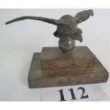 A c1930's/40's French cast metal car mascot in the form of an eagle with wings outstretched,