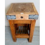 A small square vintage butcher's block on an oak stand, approx 18",