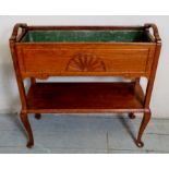 An Edwardian walnut jardiniere plant stand,