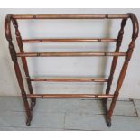 A 19th century mahogany turned towel rail,