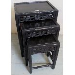 A nest of 3 graduated carved Chinese side tables,