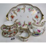 A fine early 20th century continental porcelain 8 piece cabaret set, marked "De la Reine",