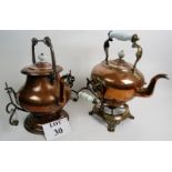 Two decorative Victorian copper kettles on original stands,