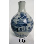 An antique Chinese blue and white pottery bottle vase, probably 17th/18th century,