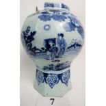 A 17th/18th century Delft vase, painted in the Chinese taste with figurative garden landscapes,