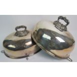 A pair of good quality 19th century silver plated meat domes, with engraved crests,