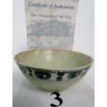 A Chinese Tek Sing blue and white ceramic bowl in the `Circle Dot` pattern,