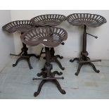 Four cast metal tractor seat single breakfast bar stools, height adjustable, est: £100-£200