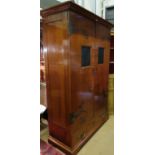 A fine quality vintage cherrywood Art Nouveau style double wardrobe cabinet with applied metal