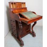 A Victorian rising top piano Davenport in figured walnut with 4 side drawers and a leathered pull