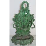 A very heavy and ornate green painted cast iron umbrella stand with impressed stamp `Fonderia,