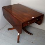A 19th century mahogany pedestal Pembroke table with an end drawer over 4 splayed legs with ebony