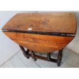 A small 20th century oak drop leaf gate leg occasional table, A/F,