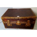 A brass bound brown leather travelling trunk, c1900,
