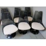 Set of 6 chrome-craft contemporary smoke grey swivel chairs, with cream pad seats,