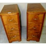 A fine pair of Art Deco walnut bedside cabinets each with three drawers and brass handles,