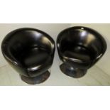 A pair of 20th century black leather swivel tub chairs with chrome bases and in good clean